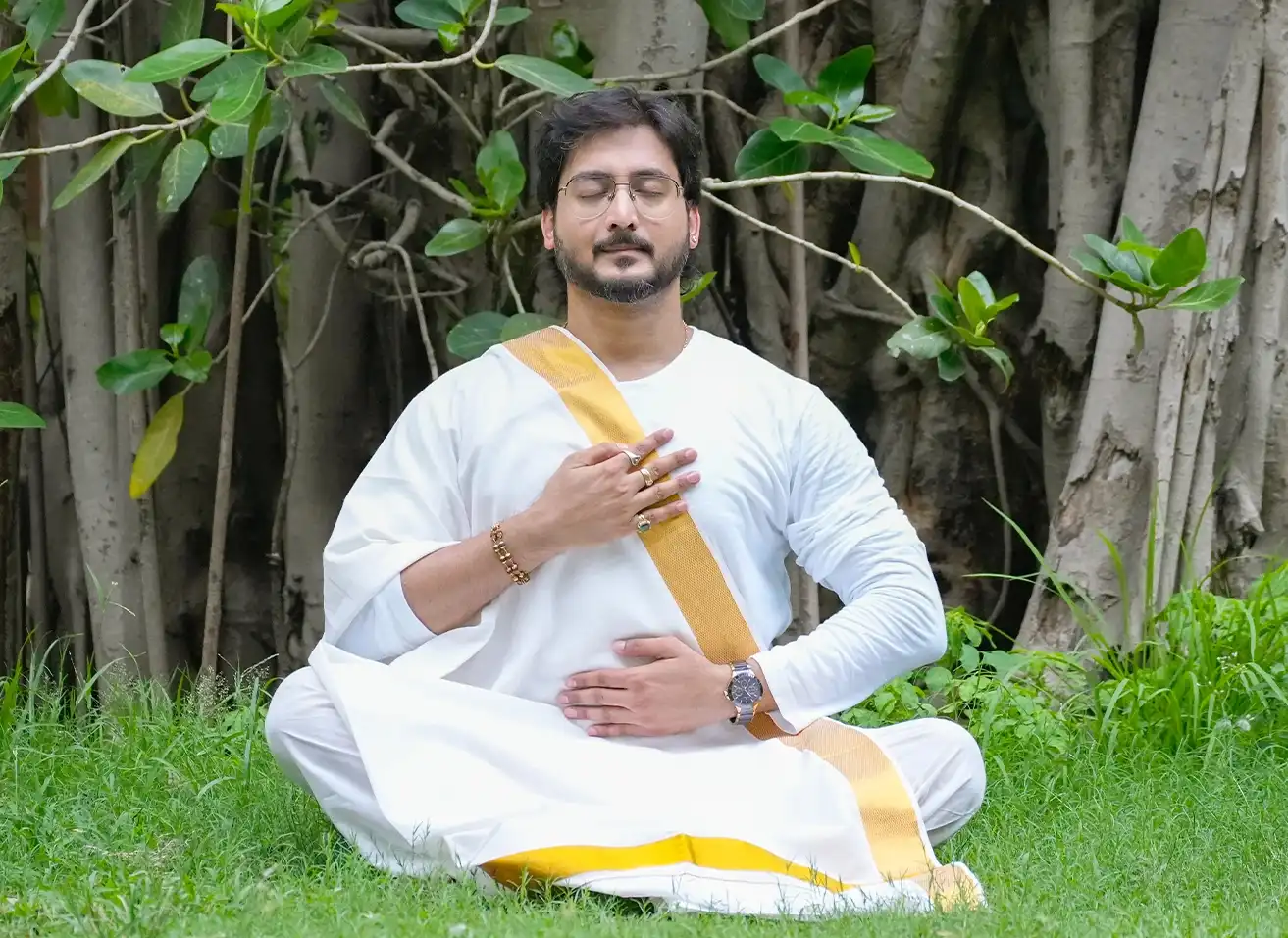 A serene seeker practicing guided meditation for anxiety relief at Nabatara Foundation ashram.